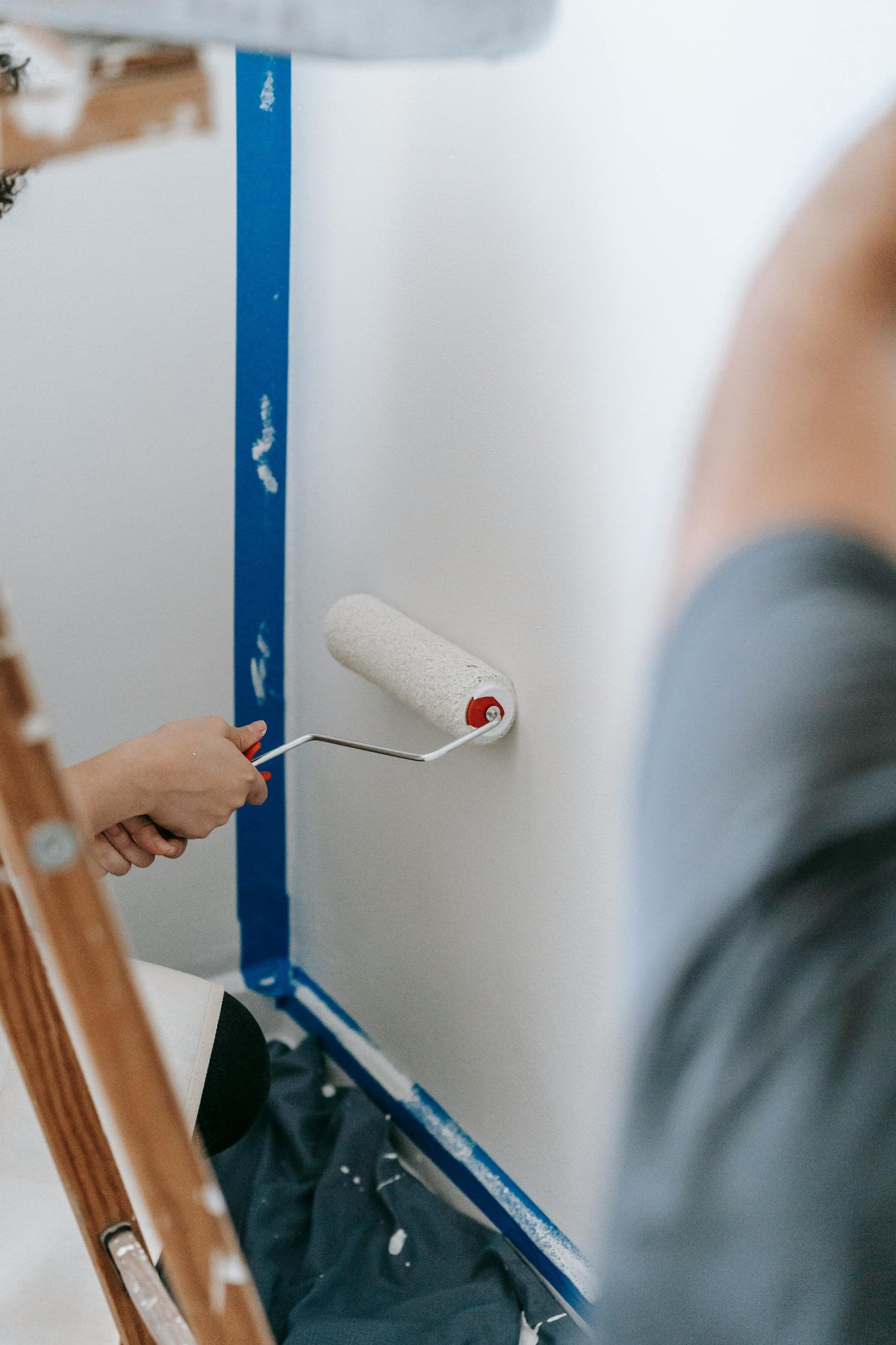 Interior wall being painted with a roller